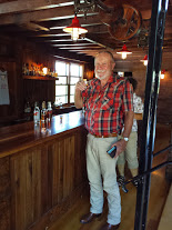 Dick samples some whisky at Red Eagle Distillery