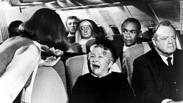 That son of a bitch next to me just sneezed on my tray table!
