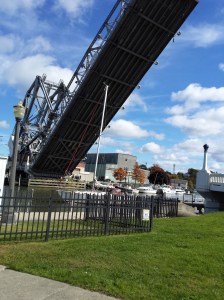 Can you spot the mast of the sail boat right under the lift bridge?